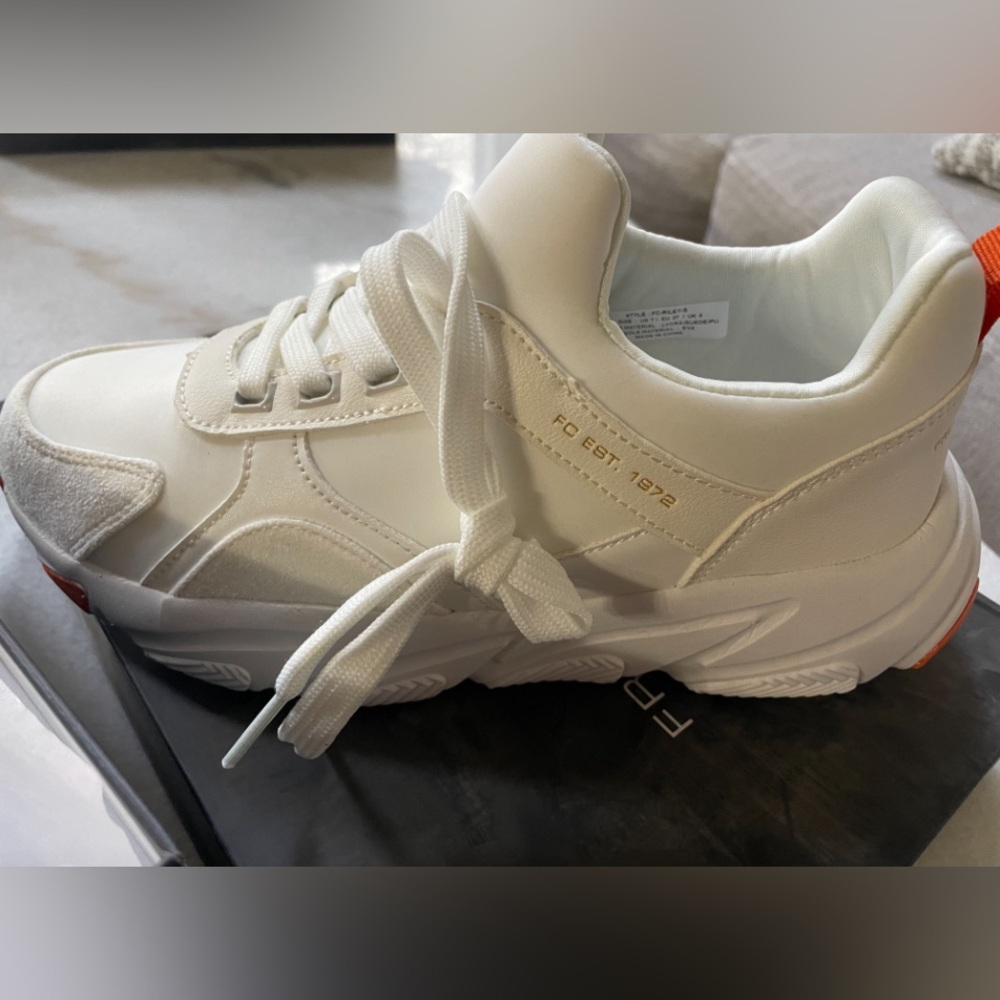 Women’s French connection ivory sneakers size 7
New in the box 
Riley 
New